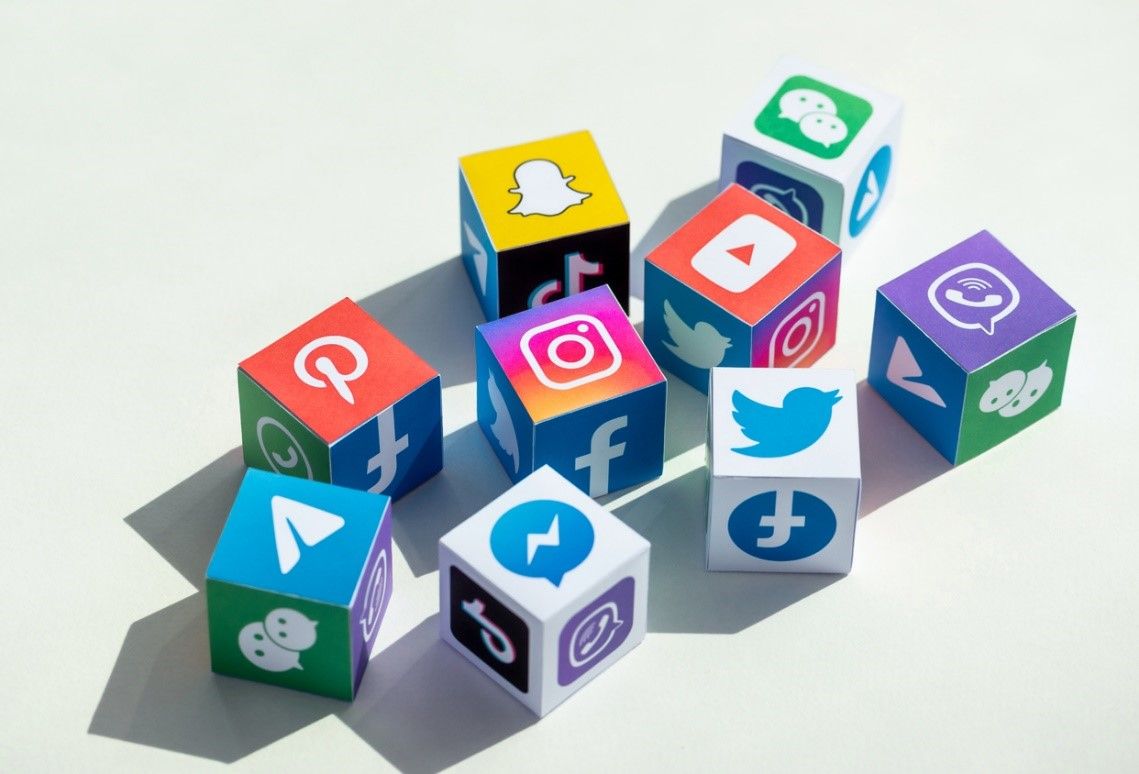 Person checking social media analytics on a mobile phone